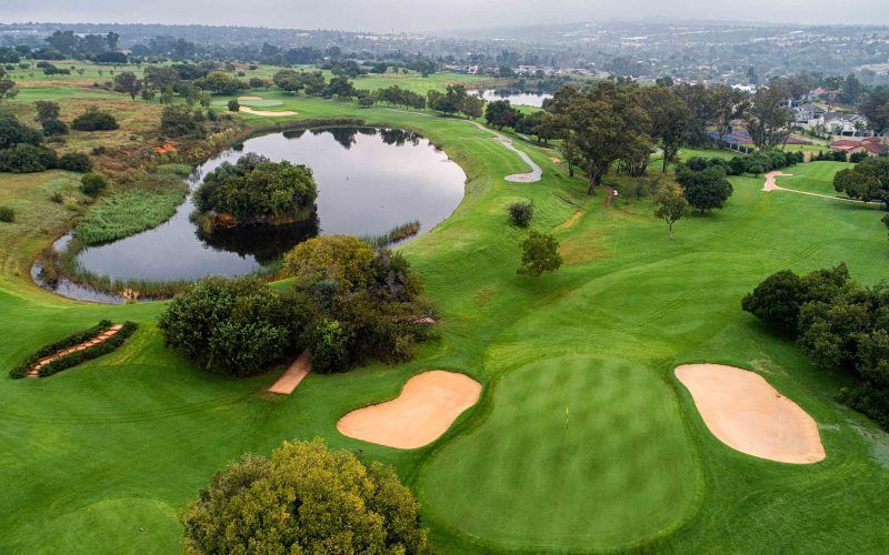 Aerial view of golf course lake and greens, Johannesburg